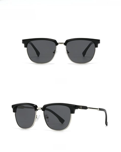 Front and side view of classic black semi-rimless sunglasses with silver metal accents