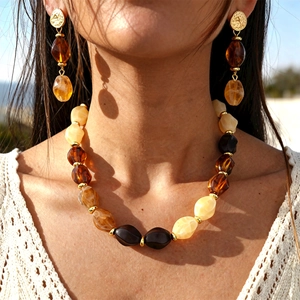 Vintage acrylic oval beaded necklace set with amber tones and gold metal accents