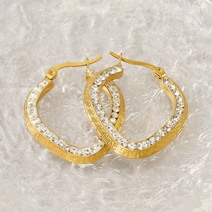 Golden titanium steel hoop earrings with Greek key pattern and sparkling zircons