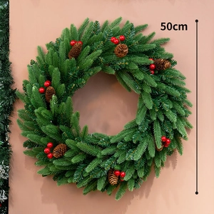 50cm Christmas wreath with dense pine needles, red berries and natural pine cones