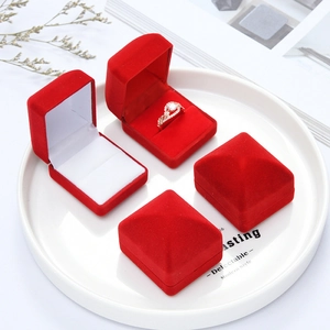 Premium red velvet jewelry box for rings with white interior slot and sleek flip design