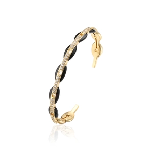 Dettaglio del bracciale placcato oro 18 carati con smalto nero e zirconi incastonati