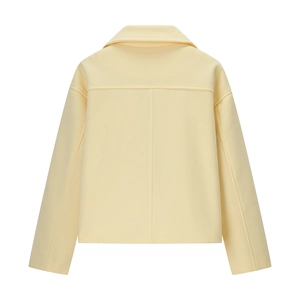 Rear view of a stylish pale yellow short wool coat featuring a clean minimalist silhouette