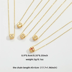 Minimalist gold cube letter necklace with cubic zirconia for women featuring various initials