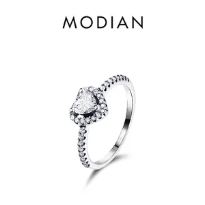 Elegant S925 sterling silver heart-shaped halo ring with pavé-set zircon stones on white background