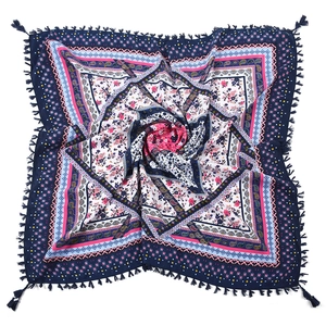 Detailed pattern of bohemian floral square scarf with elegant blue and pink tassel edges