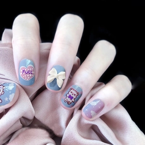 Matte press-on nails with 3D bows, bear patterns and blue-purple gradient finish