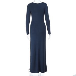 Rear view of a tight slim fit navy blue long sleeve maxi dress with smooth texture