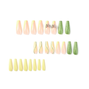 French green edge press-on nails with glitter butterflies and long coffin shape design