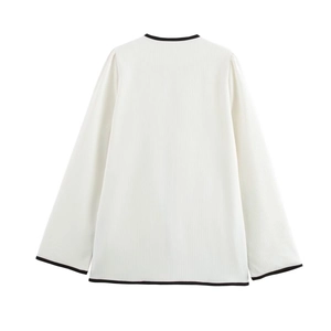 Women's stylish long-sleeved top with black contrast trim and vertical ribbed texture