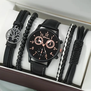 Detail view of quartz watch with woven beaded bracelets inside a brown gift box