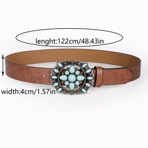 Detail of vintage brown embossed leather belt with turquoise inlaid buckle and size guide