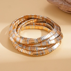 Minimalist geometric multilayer snake pattern elastic bracelet in gold and silver finish