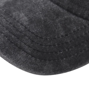 Detail view of reinforced stitching on washed cotton baseball cap brim with daddy embroidery