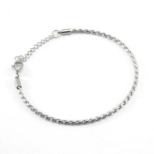 Polished silver stainless steel twist chain bracelet with lobster clasp on white background