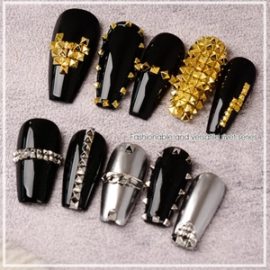 Punk style black and silver false nails with 3D metallic rivets and chain decorations