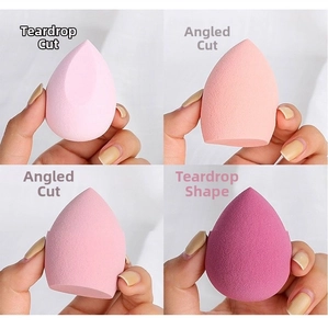 Detailed close-up showing four pink makeup sponge shapes for precise beauty application