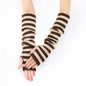 Close-up of brown and white striped knitted arm warmers on hands with crisscross pose
