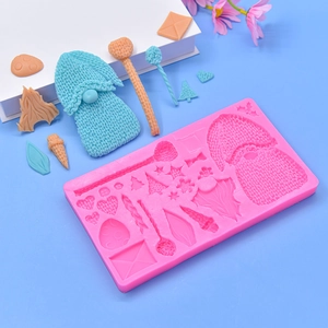Pink silicone mold for Christmas gnome and knitted texture fondant or clay crafts