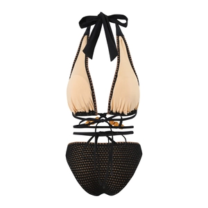 Close-up of bohemian bikini with multi-layer beaded straps and mesh fabric texture