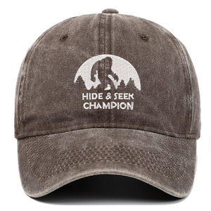 Vintage brown washed cotton baseball cap featuring white Hide & Seek Champion embroidery