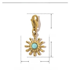 Detail view of gold sunburst pendant with natural blue stone and size measurements