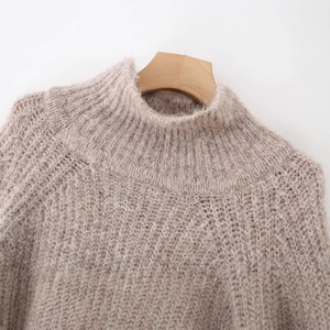 Elegant oatmeal knit turtleneck sweater in soft alpaca wool blend with ribbed collar