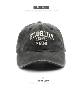 Close-up of vintage grey washed denim baseball cap with Florida 1822 Miami embroidery