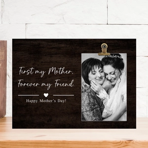 Macro shot of wooden photo clip plaque featuring First my Mother Forever my Friend text