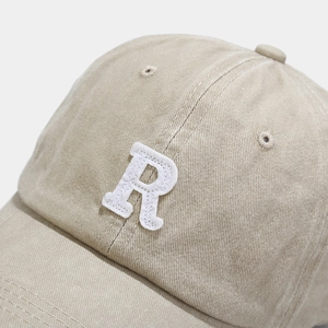 Vintage washed khaki cotton baseball cap with a 3D white towel embroidered letter R