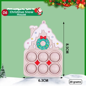 Pink Christmas house Pop-it toy keychain with Santa decorations and size 8.5x6.3cm