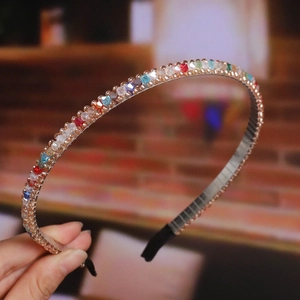Handmade beaded headband with colorful faceted crystals and comfortable black end tips