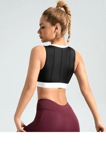 Detailed back view of high-impact yoga bra with vertical stripes and contrast color design