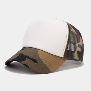 Detail of white foam front panel and jungle camouflage mesh back on the trucker hat