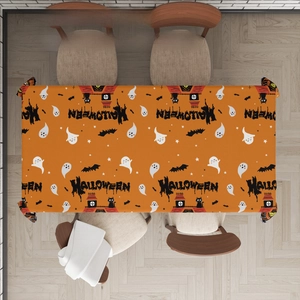 Detailed Halloween PE tablecloth with ghost and pumpkin patterns on a dining table