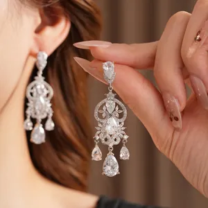 Elegant silver tassel earrings with sparkling teardrop zircons in a vintage chandelier style