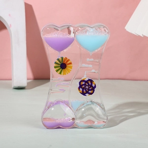 Double heart liquid timer with spinning windmill in purple and blue glitter oil