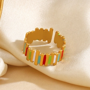 Chic colorful enamel geometric open ring with golden wave design on silk background