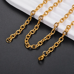 Minimalist gold stainless steel O-chain necklace with classic lobster clasp on dark base