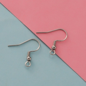 Silver stainless steel spring earring hooks for DIY jewelry making on dual color background