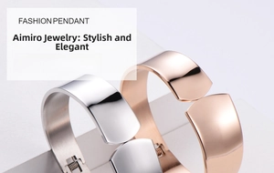 Macro shot of silver and rose gold polished wide bangles with geometric shield details