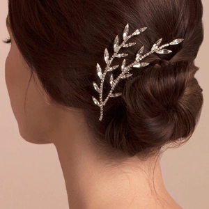 Elegant silver bridal hair pins with sparkling leaf-shaped crystal rhinestones for wedding
