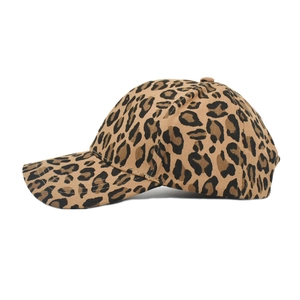 Close-up of the cotton fabric texture and classic leopard print on a baseball cap