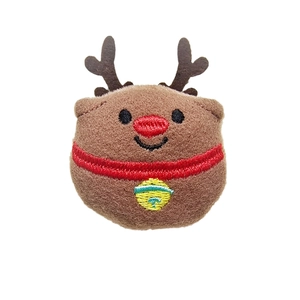 Plush Christmas reindeer head with red nose and yellow bell on clean white background