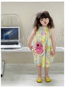Girl's summer floral dress with pink pearl strap handbag and yellow bow shoes