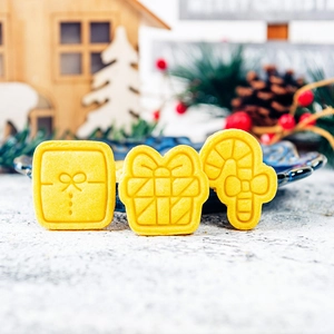 Christmas cartoon cookie molds featuring Santa tree and reindeer shapes for festive baking