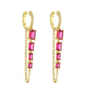 Elegant gold drop earrings with pink baguette zircons and delicate long chain fringe