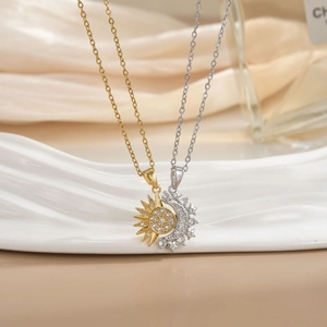 Macro shot of sun and moon couple necklaces with micro-pave cubic zirconia stones