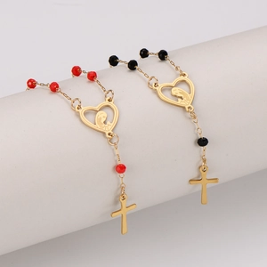 Golden stainless steel rosary bracelet with heart medallion and cross in red and black