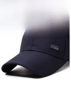 Close-up of navy blue baseball cap with classic metal plate and twill cotton texture